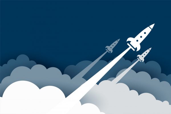 flying rocket over the clouds in papercut style